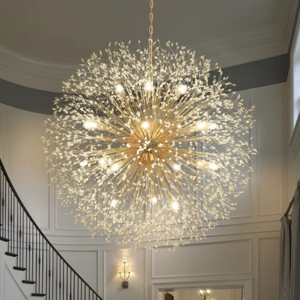 Modern chandelier in elegant stairway interior.
