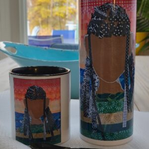Mug and tumbler with abstract face design.